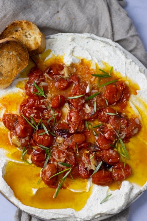 creamy feta dip with tomato, garlic and olive oil